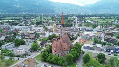 Arial view of Pfarrkirche St. Laurentius church in Schaan, Liechtenstein Video stock 244979700