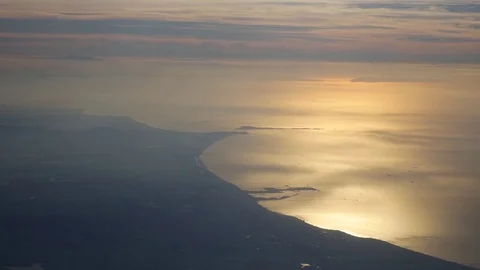 Arial view of shore line and the gulf of Thailand from an air plane Stock Footage 71055065