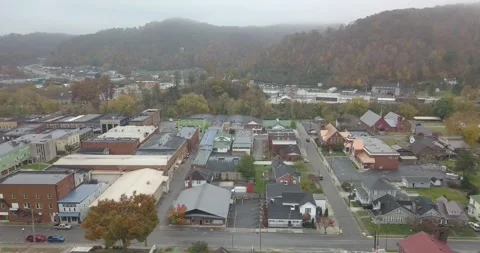 Arial View of Small Rural Town on Foggy Fall Morning in the Mountains Stock Footage 231232708