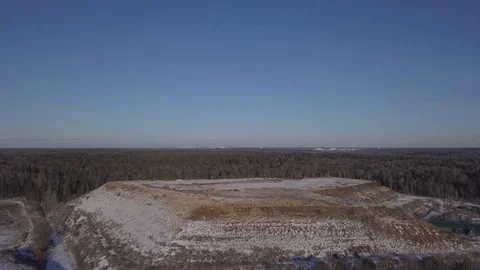 Arial View of Snow Covered Garbage Site Vídeos de archivo 125398775