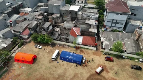ARIAL VIEW OF SOME HOUSE IN TAMBORA AFTER BURN WITH FIRE Stock Footage 288480830