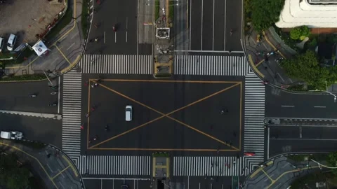 ARIAL VIEW OF SQUARE ZEBRA CROSS IN THAMRIN NEAR SARINAH MALL AT CENTRAL JAKARTA Stock Footage 160653251