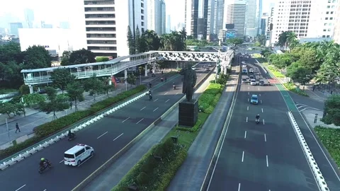 ARIAL VIEW OF SUDIRMAN ROAD AT CENTRAL JAKARTA, INDONESIA Stock Footage 160985388