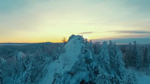 Arial view of Top Of Mountain Taganay Russia at sunset with the sun in the Stock-Footage 102766429