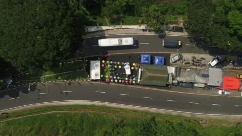 ARIAL VIEW OF TRAFFIC IN GENTONG CIRCLE, TASIKMALAYA, INDONESIA Stock Footage 239470119