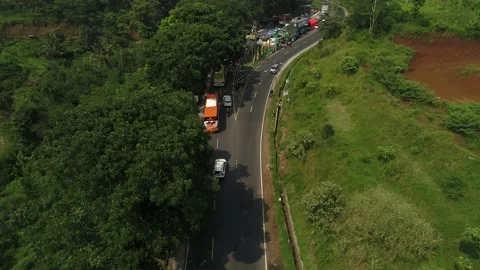 ARIAL VIEW OF TRAFFIC IN GENTONG CIRCLE, TASIKMALAYA, INDONESIA Stock Footage 239474562