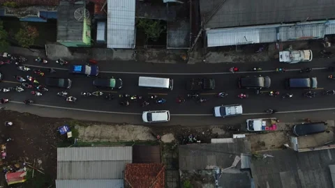 ARIAL VIEW TRAFFIC JAM AT PASAR LEWO MALANGBONG, GARUT Stock Footage 239467460
