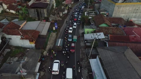 ARIAL VIEW TRAFFIC JAM AT PASAR LEWO MALANGBONG, GARUT Stock Footage 239467825