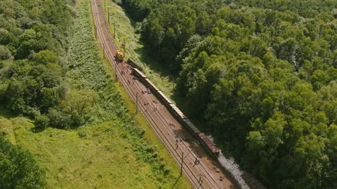 Arial view. Train accident. Rescue relief works in progress locomotive derailed Stock Footage 160131864
