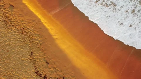 Arial view of waves flowing on the beach Video stock 152492180