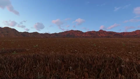 Arid Desert Landscape with Distant Mountains Under a Clear Blue Sky Video stock 330920001