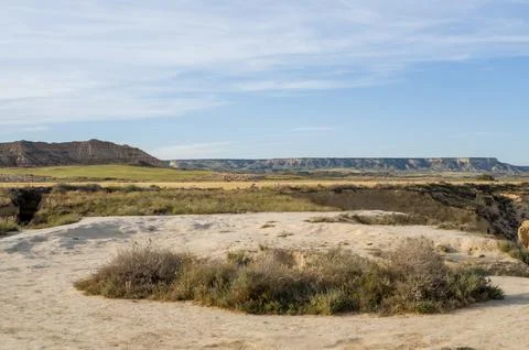 Arid fields and cliffs in the Bardenas Reales Stock Photos