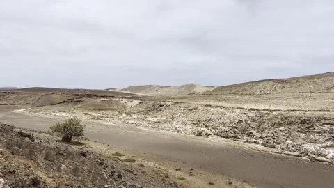 Arid landscape of dry riverbed on boa vista island, cape verde Stock Footage 302537003