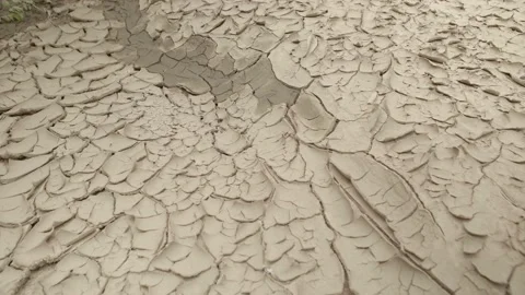 Arid or Cracked soil texture background, climate change and global warming Stock Footage 154189647