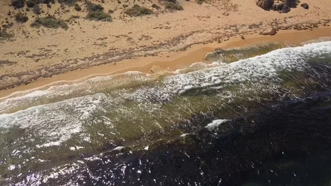 Ariel 4K view of ocean waves Stock Footage 105042913