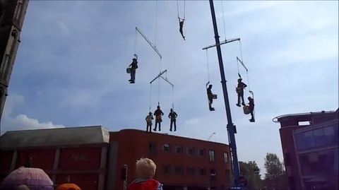 Ariel Acrobat and Drummers Stock Footage 95227002