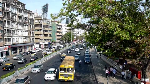 Ariel angle View Moving road traffic, Marine Drive Mumbai city Maharashtra India Stock Footage 232210522