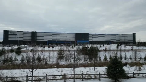 Ariel drone Amazon Building in the winter time - ped up Stock Footage 236409167