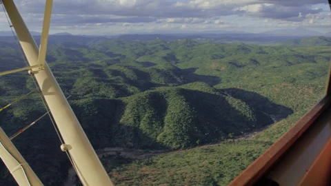 Ariel of multiple valleys across the savannah grassland in Kenya Stock-Footage 261026251