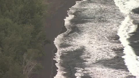 Ariel View Of A Black Sand Beach and Tropical Landscape 2 Stock-Footage 19276101