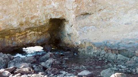 Ariel view of Ocean cave at Smugglers cove Video stock 149338439