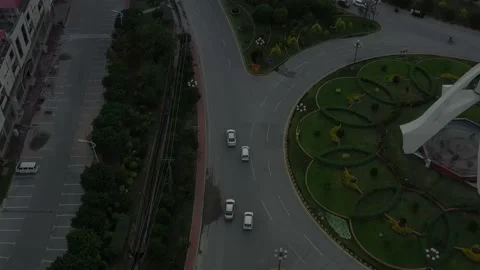 Ariel view of white car going on a road Stock Footage 133003363