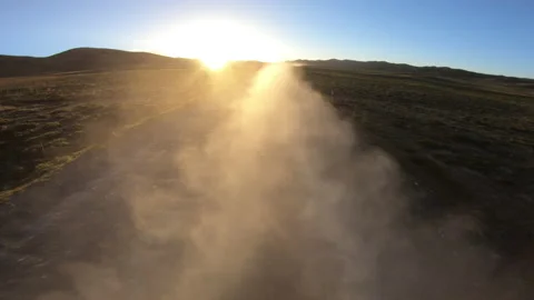 Arising dust ash in the behind  of car in sunset Video stock 138844481