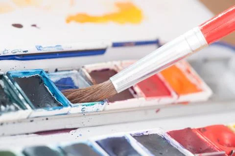 Aristic paint and brushes Stock Photos