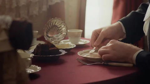 Aristocratic Man Putting Butter on Bread during Lunchtime Stock Footage 290512860