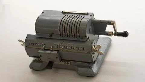 Arithmometer, old and retro computer for mathematical calculations Stock Photos