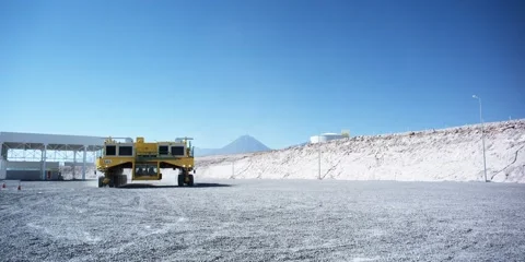 Arizona salt mine; heavy equipment passing above camera as operators wave Stock Footage 59185142