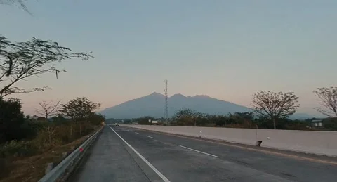 Arjuno Mountain at sunrise Stock Footage 282188882