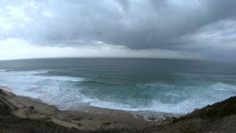 Ark and dramatic storm cloud area background in a beach Stock Footage 134835256