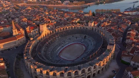 Arles rooftops shine under sunrise in southern France Stock Footage 307317087