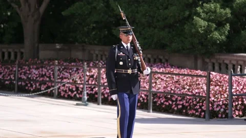 ARLINGTON - 5.5.2025 - Slow motion view of a sentinel marching at the Tomb of Stock Footage 312863595