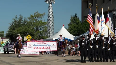 Arlington Independence Day Parade procession with color guard and mounted riders Video stock 340940825
