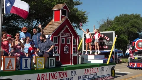 Arlington ISD parade float with schoolhouse and dancers 스톡 동영상 340940944