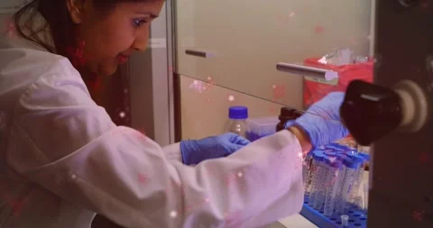 Arm closeup reaching causing pullback lab tech checking tubes and hands helping Stock Footage 334315975
