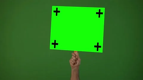 Arm holding a green screen sign with tra... | Stock Video | Pond5