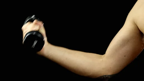 Arm of man, biceps curl exercise with 3 kg dumbbells Stock Footage 157501061