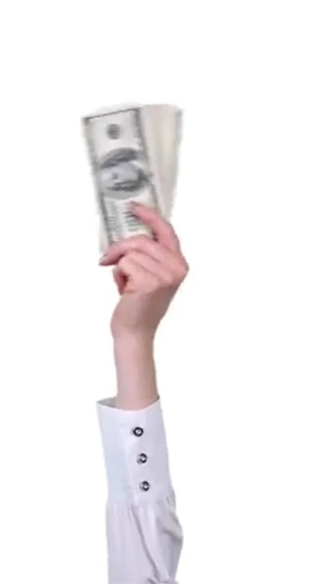 Arm raising stack of hundred dollar bills against plain white surface. 스톡 동영상 336326819