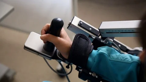 Arm Rehabilitation Controller Technology. View of Middle Age Women in Glasses Stock Footage 84177835
