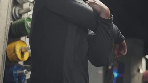 Arm Stretch in Cinematic Lighting Stock Footage 76723268