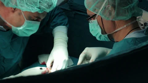 Arm surgery. Surgeons team performing operation hand in hospital operating room. Stock Footage 34926587