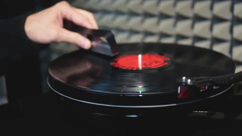The arm of the turntable is lowered Stock Footage