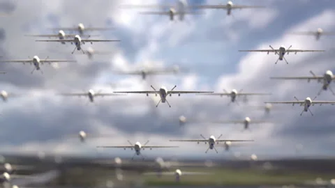 Armada of military drones flying against the backdrop of a beautiful cloudy sky. Stock Footage 234745929