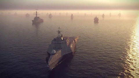 Armada of warships floating on the ocean Stock Footage 83493270