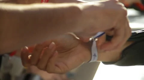 Armband being attached Stock Footage 63598909