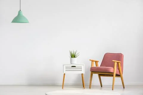 Armchair and table Stock-Fotos