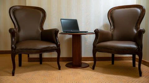 Armchairs and table Stock Photos